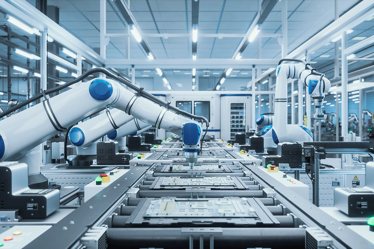 An automated production line featuring several industrial robots, designed to ensure precise and efficient production processes in modern manufacturing.